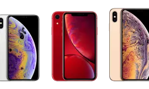 Trzy iPhone'y: biały, czerwony i złoty. Zastanawiasz się, ile cali ma iPhone X? Ten model ma 5,8 cala.