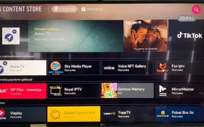 Ekran LG Content Store. Widoczne są aplikacje takie jak Astra TV, Sky Media Player, Voice NFT Gallery, Fox Iptv, WP Pilot, Royal IPTV, Genious Memory, MirrorMeister, ViaPlay, Digital Concert Hall, YuppTV, Polsat Box Go. Możesz tu łatwo dowiedzieć się, ...
