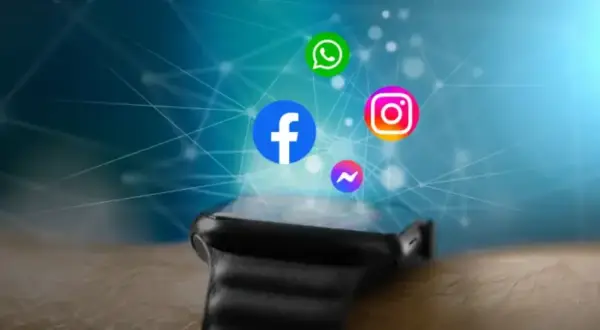 Ikony Facebook, Instagram, WhatsApp i Messenger unoszą się nad nowoczesnym smartwatchem, sugerując, jak dodać aplikacje do smartwatcha.