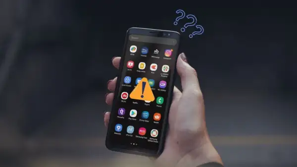Zastanawiasz się, jak pobierać płatne aplikacje za darmo na Androida? Na ekranie telefonu widnieje ostrzeżenie, a nad nim znaki zapytania.